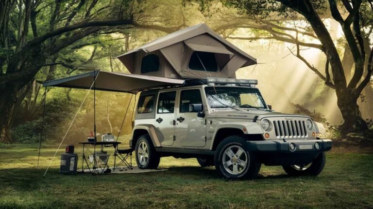Jeep with Roof Top Tent and Awning in Forest